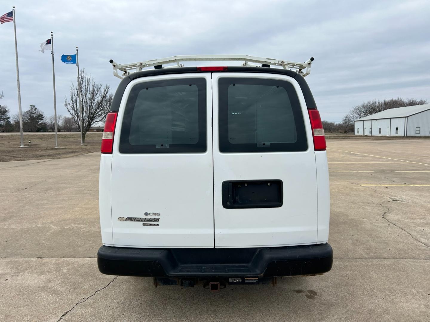 2012 White /Gray Chevrolet Express 2500 Cargo (1GCWGFCB4C1) with an 6.0L V8 OHV 16V FFV engine, 6-Speed Automatic transmission, located at 17760 Hwy 62, Morris, OK, 74445, (918) 733-4887, 35.609104, -95.877060 - Photo#5